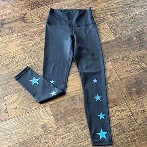 Wildfox Black Leggings with holographic star accents